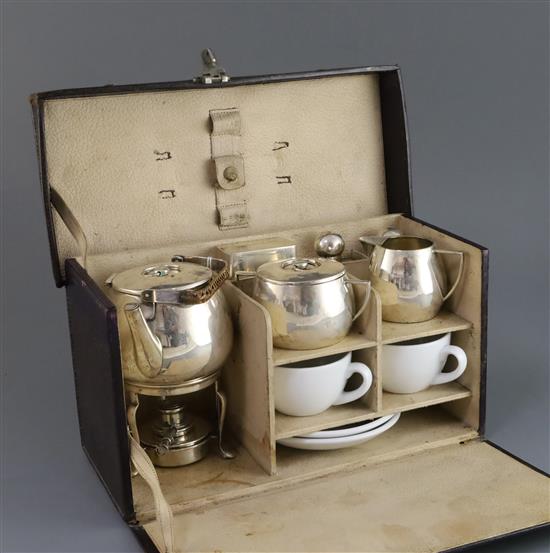 A cased early 20th century German 935 standard silver and porcelain travelling picnic set,